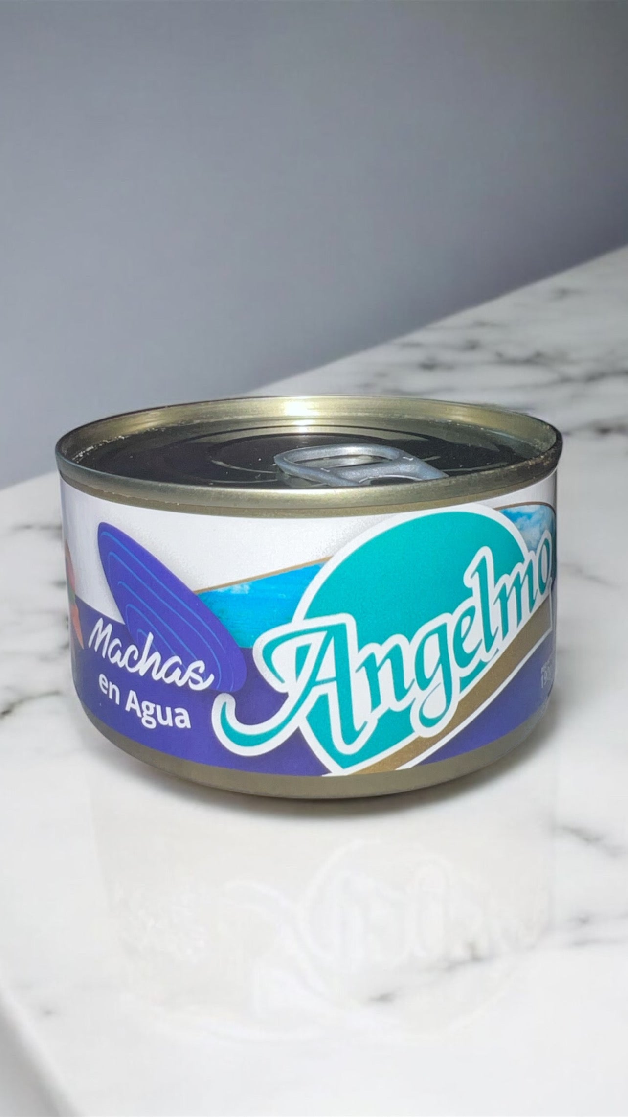 Machas Angelmo chilenas en agua, frasco listo para cocinar.