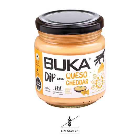 Pote de Dip Untable sabor Queso Cheddar marca Buka, mostrando una textura cremosa de color naranja ideal para untar.