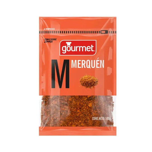 Merquén Gourmet polvo de ají rojo intenso, mostrando la textura del aliño ahumado chileno.