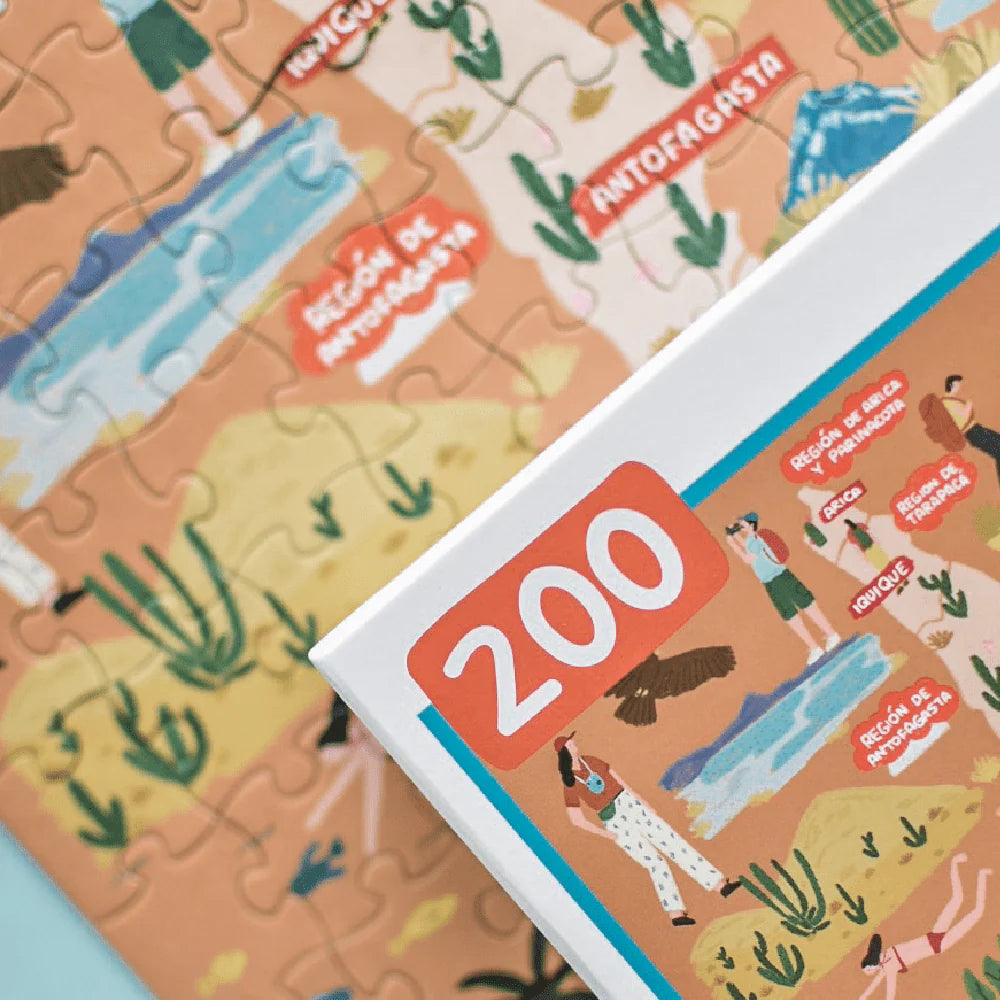 Caja de puzzle de 200 piezas ilustrando regiones y ciudades de Chile.
